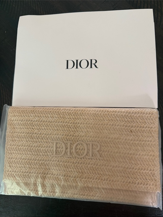 Dior Handbags - Dior Beige Woven Straw Clutch with Embossed Logo